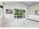 Cozy living room with a walkout to a screened lanai and elegant decor at 7991 Lake James Blvd, Lakeland, FL 33810