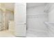 Spacious walk-in closet with ample shelving for organized storage and easy access to clothing and accessories at 7991 Lake James Blvd, Lakeland, FL 33810