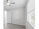 Comfortable bedroom featuring a ceiling fan, closet and a window that brings in natural light at 9413 5Th Ave, Orlando, FL 32824