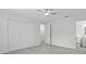 Large bedroom with closet, ceiling fan, and en-suite bathroom at 9413 5Th Ave, Orlando, FL 32824