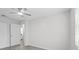 Inviting bedroom showcasing gray flooring, a closet and bright windows that brings in natural light at 9413 5Th Ave, Orlando, FL 32824