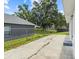 Long driveway leading to a fenced backyard at 9413 5Th Ave, Orlando, FL 32824