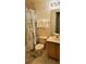 Well-lit bathroom with shower/tub combination, single sink vanity, and toilet at 189 Minniehaha Cir, Haines City, FL 33844