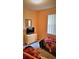 Twin bedroom featuring a light wood dresser and window, plus Star Wars themed bedding at 189 Minniehaha Cir, Haines City, FL 33844
