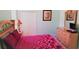 Lovely bedroom with a king-size bed and ample natural light at 189 Minniehaha Cir, Haines City, FL 33844