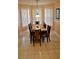 Formal dining room with seating for eight and lots of natural light at 189 Minniehaha Cir, Haines City, FL 33844