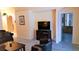 Bright living room area with wood look floors and large television at 189 Minniehaha Cir, Haines City, FL 33844