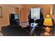 Cozy living room featuring a decorative fireplace and neutral decor at 189 Minniehaha Cir, Haines City, FL 33844