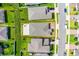 Drone eye-view showcasing the yard with a paved patio and firepit at 2296 Crossbow St, Clermont, FL 34715