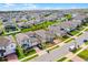 Aerial view showcasing the home's property lines, landscaping, and neighborhood setting at 2296 Crossbow St, Clermont, FL 34715