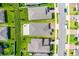 Aerial view showcasing the backyard with a paved patio and firepit at 2296 Crossbow St, Clermont, FL 34715