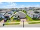 Charming single-Gathering home featuring manicured lawn, brick pathway and driveway in a pleasant community at 2296 Crossbow St, Clermont, FL 34715