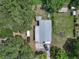 Aerial view of home on lot with large trees and shed at 2912 Fletcher Ave, Lakeland, FL 33803