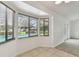 Bright breakfast nook with large windows offering views of the backyard swimming pool at 4221 Meadowbend Ct, Lakeland, FL 33811