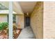 Inviting covered entrance of a well-maintained brick home at 4221 Meadowbend Ct, Lakeland, FL 33811