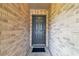 Close-up of the front door, showcasing the brick entryway at 4221 Meadowbend Ct, Lakeland, FL 33811