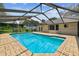 The screened pool offers a relaxing oasis for leisure and recreation at 4221 Meadowbend Ct, Lakeland, FL 33811