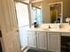 Bright bathroom with a glass enclosed shower, tile floors, and a vanity at 314 Lake Butler Dr, Kissimmee, FL 34759