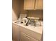 Washer and dryer featuring storage space at 314 Lake Butler Dr, Kissimmee, FL 34759