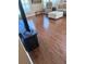 Open concept living room featuring hardwood floors and natural lighting at 314 Lake Butler Dr, Kissimmee, FL 34759