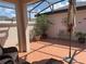 Outdoor patio with red brick pavers, potted plants, and comfortable seating at 314 Lake Butler Dr, Kissimmee, FL 34759