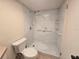 Accessible bathroom showcasing a walk-in shower with safety features and neutral tile at 454 San Jose Dr, Winter Haven, FL 33884