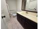 Bathroom featuring a spacious vanity and accessible mobility equipment at 454 San Jose Dr, Winter Haven, FL 33884