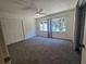 Bright bedroom features vaulted ceilings, large windows, and ample closet space at 454 San Jose Dr, Winter Haven, FL 33884