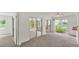 Spacious bedroom with sliding glass doors and lush outdoor views at 454 San Jose Dr, Winter Haven, FL 33884