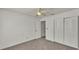 Bedroom featuring carpet, ceiling fan, and closet at 454 San Jose Dr, Winter Haven, FL 33884