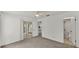 Spacious bedroom with carpet, natural light, and en suite bathroom at 454 San Jose Dr, Winter Haven, FL 33884