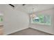 Dining room with neutral carpet and natural light at 454 San Jose Dr, Winter Haven, FL 33884