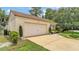 Charming single-story home with a two-car garage and well-maintained landscaping at 454 San Jose Dr, Winter Haven, FL 33884
