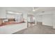 Well-lit kitchen with tiled floors and breakfast bar at 454 San Jose Dr, Winter Haven, FL 33884