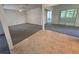Open floor plan seamlessly connecting the dining area to the living room with tile flooring at 454 San Jose Dr, Winter Haven, FL 33884