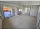 Enclosed patio with multiple access points, offering a seamless blend of indoor/outdoor living at 454 San Jose Dr, Winter Haven, FL 33884