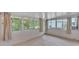 Enclosed sunroom with natural light coming through multiple windows at 454 San Jose Dr, Winter Haven, FL 33884