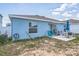 Charming backyard with a cozy patio area, perfect for outdoor relaxation and entertaining at 621 Silver Palm Dr, Haines City, FL 33844