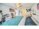 Spacious primary bedroom featuring a desk area and ample closet space at 621 Silver Palm Dr, Haines City, FL 33844