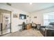 Home office featuring a desk, recliner, and lots of natural light at 621 Silver Palm Dr, Haines City, FL 33844