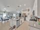 Open-concept kitchen with a large island, modern appliances, and an inviting eat-in dining area at 621 Silver Palm Dr, Haines City, FL 33844
