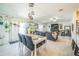 Open concept dining and living area featuring an abundance of natural light and inviting décor at 621 Silver Palm Dr, Haines City, FL 33844
