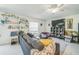 Comfortable living room features a neutral color palette, modern decor, and an abundance of natural light at 621 Silver Palm Dr, Haines City, FL 33844