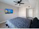 Cozy bedroom featuring contemporary flooring, neutral paint, and ample natural light at 202 E South St # 5050, Orlando, FL 32801