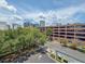 Expansive city view showcasing the skyline with lush greenery in the foreground at 202 E South St # 5050, Orlando, FL 32801
