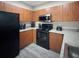 Efficient kitchen equipped with appliances and ample cabinet space, perfect for meal preparation at 202 E South St # 5050, Orlando, FL 32801