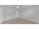 The spacious bedroom features neutral carpet, white walls, and easy access to en-suite bathroom at 3582 Milano Ave, Lakeland, FL 33803