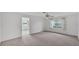Spacious bedroom featuring neutral carpet, ceiling fan, and window at 3582 Milano Ave, Lakeland, FL 33803