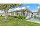 Charming single-story home with lush green lawn and mature trees creating a peaceful setting at 3582 Milano Ave, Lakeland, FL 33803