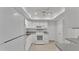 A kitchen with white appliances and light-colored countertops at 3582 Milano Ave, Lakeland, FL 33803